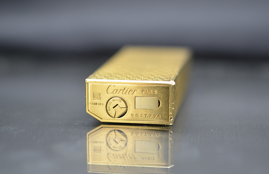 Cartier bọc vàng dày 5 cạnh hoa văn