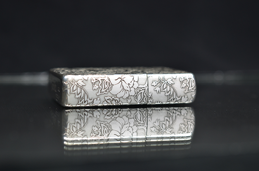 Zippo bạc khối khắc hoa các mặt